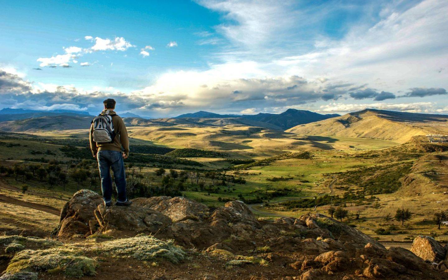 a man hiking in the mountains